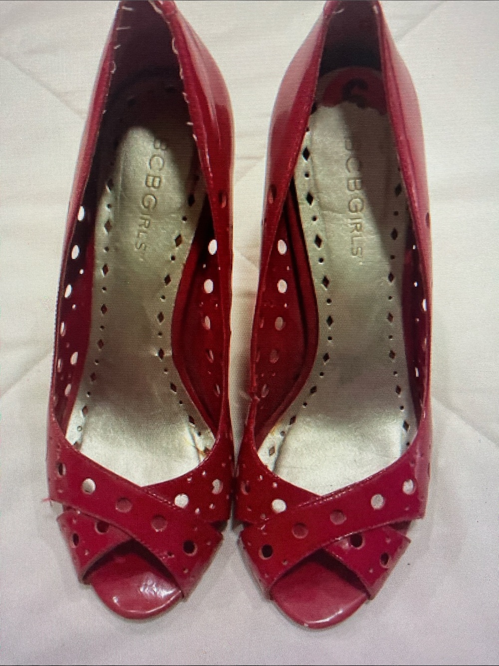 BCBGirls Red Patent Peep-Toe Heels with Perforated Detail